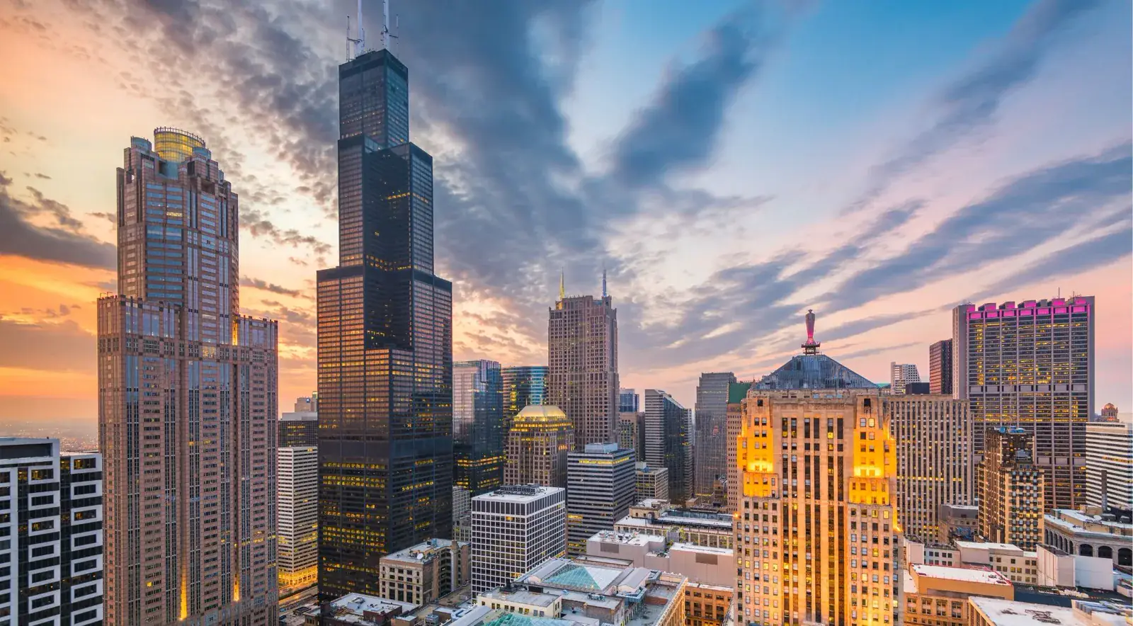 Chicago skyline at sunset with Willis Tower at center